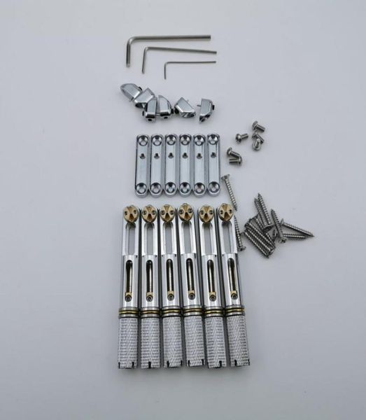 chrome single headless guitar bridge headless fanned fret single fixed brass fan bridges for 6 string electric guitar1550420
chrome single headless guitar bridge headless fanned fret single fixed brass fan bridges for 6 string electric guitar1550420