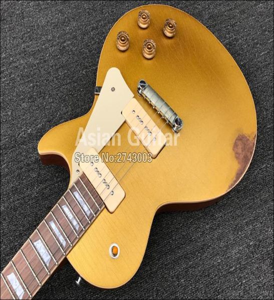 custom shop heavy relic gold goldelectric guitar one piece mahogany body neck p90 pickups wrap around tailpiece grov7823396 
custom shop heavy relic gold goldelectric guitar one piece mahogany body neck p90 pickups wrap around tailpiece grov7823396