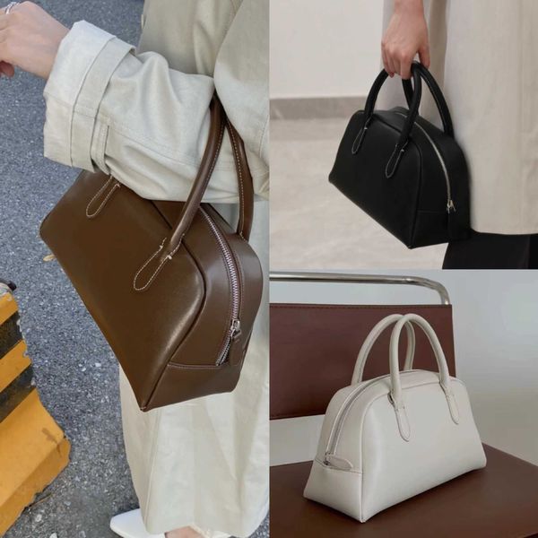 nothing written boston bag leather handbag fashion versatile premium cowhide commuter bag
nothing written boston bag leather handbag fashion versatile premium cowhide commuter bag