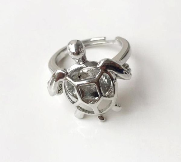 cage ring can open and hold 8mm pearl crystal gem bead cage ring mounting 18kgp adjustable size turtle ring5172953, Golden;silver
cage ring can open and hold 8mm pearl crystal gem bead cage ring mounting 18kgp adjustable size turtle ring5172953, Golden;silver