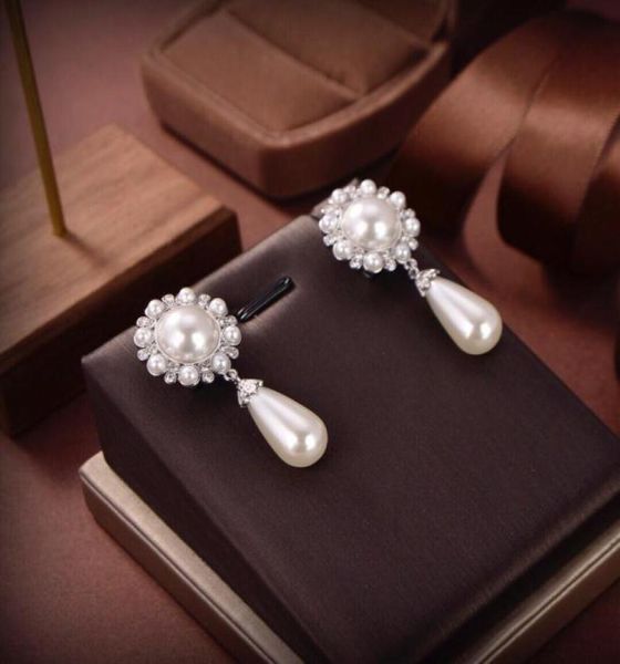 earrings are popular in small groups with a high sense of luxury crystal flowers water drops and pearls6888377, Silver
earrings are popular in small groups with a high sense of luxury crystal flowers water drops and pearls6888377, Silver
