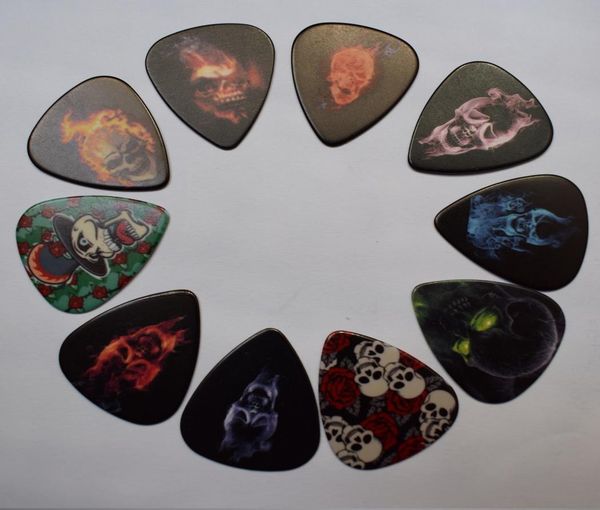 10pcs skull design celluloid guitar picks with metal pick holder box for thanksgiving day gift4783855
10pcs skull design celluloid guitar picks with metal pick holder box for thanksgiving day gift4783855