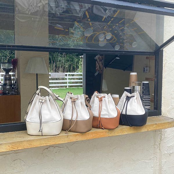 new bag women's bag canvas splicing single shoulder bag minority messenger bag fashion large capacity portable bucket bag
new bag women's bag canvas splicing single shoulder bag minority messenger bag fashion large capacity portable bucket bag