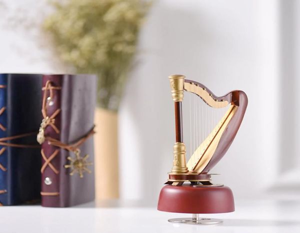handmade wooden harp rotating musical box arts mini wood harp model music box9870572
handmade wooden harp rotating musical box arts mini wood harp model music box9870572