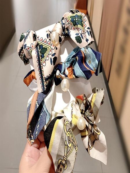 20pcslot fashion simple printed fabric pearl hair ring sweet girl hair rope head rope hair ring6494147
20pcslot fashion simple printed fabric pearl hair ring sweet girl hair rope head rope hair ring6494147