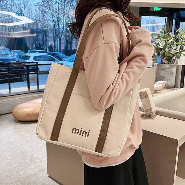 new women's canvas bag handheld shoulder bag handheld tote bag large capacity simple letter student girl shopping bag trend
new women's canvas bag handheld shoulder bag handheld tote bag large capacity simple letter student girl shopping bag trend