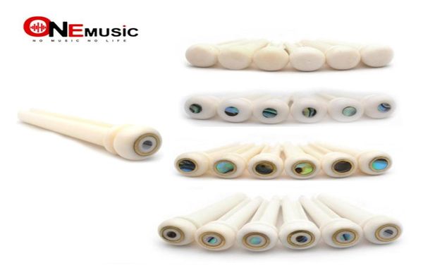 getmusic 60pclot guitar bridge cattle bone pins with brass circle pearl shell dot string nails pin nature color of bone4139963
getmusic 60pclot guitar bridge cattle bone pins with brass circle pearl shell dot string nails pin nature color of bone4139963
