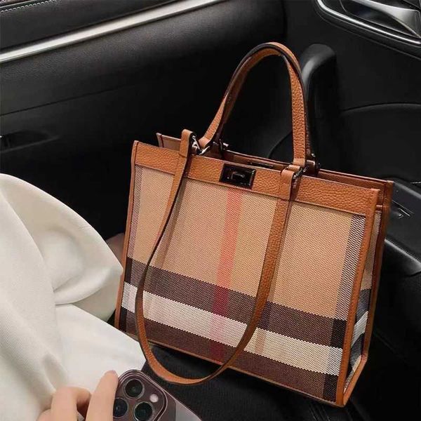 fashionable and casual large capacity women's bag trend new checker bag handheld oblique straddle large bag tote bag women's handh
fashionable and casual large capacity women's bag trend new checker bag handheld oblique straddle large bag tote bag women's handh