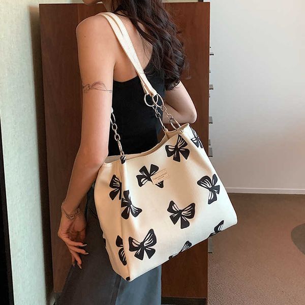 canvas bag for women with large capacity new summer versatile shoulder bag fabric bag texture commuting tote bag
canvas bag for women with large capacity new summer versatile shoulder bag fabric bag texture commuting tote bag