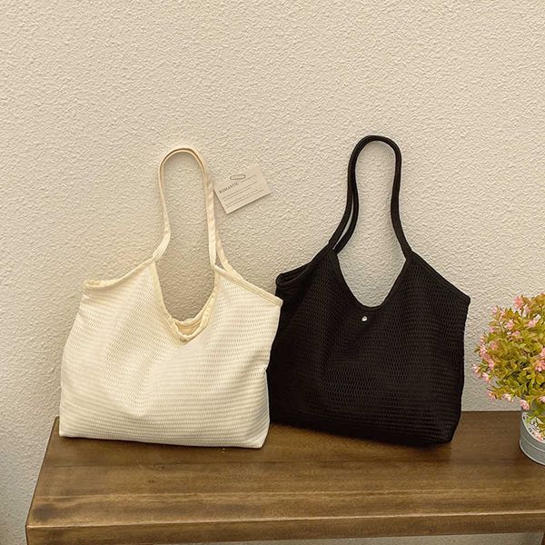 large capacity handbag mesh simple beach bag one shoulder versatile commuting computer bag student class bag female
large capacity handbag mesh simple beach bag one shoulder versatile commuting computer bag student class bag female