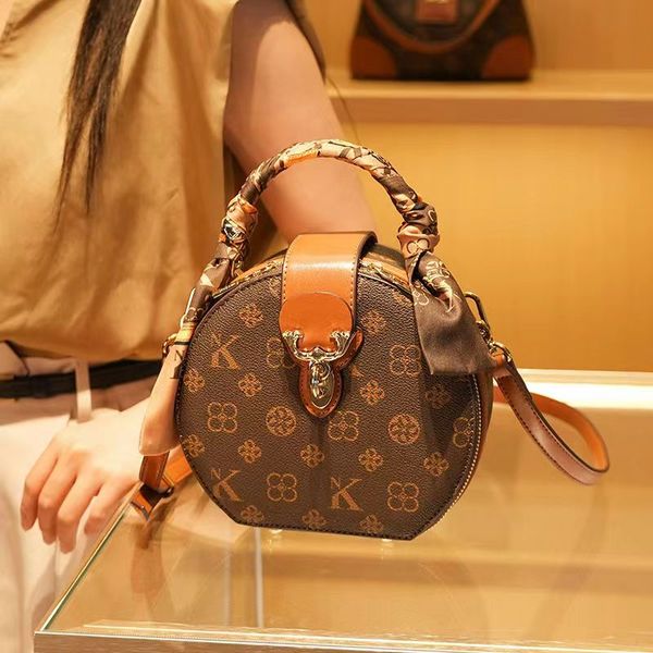 high-speed clutch leather mini satchel women's bag 2023 spring and summer new fashion all-match one-shoulder portable small round bag d
high-speed clutch leather mini satchel women's bag 2023 spring and summer new fashion all-match one-shoulder portable small round bag d