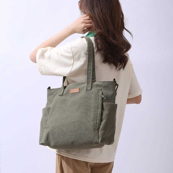 high capacity canvas women's bag new trendy version shopping bag student tutoring portable one shoulder tote bag
high capacity canvas women's bag new trendy version shopping bag student tutoring portable one shoulder tote bag