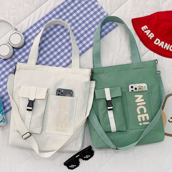 new canvas bag schoolgirl handbag fashion large capacity messenger bag leisure letter shoulder bag
new canvas bag schoolgirl handbag fashion large capacity messenger bag leisure letter shoulder bag