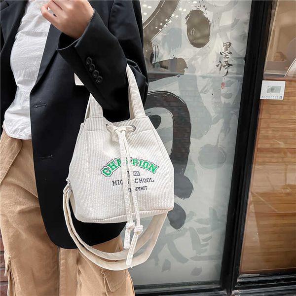 small design canvas bag for women's new college feng shui bucket for quality enhancement large capacity handheld shoulder bag
small design canvas bag for women's new college feng shui bucket for quality enhancement large capacity handheld shoulder bag