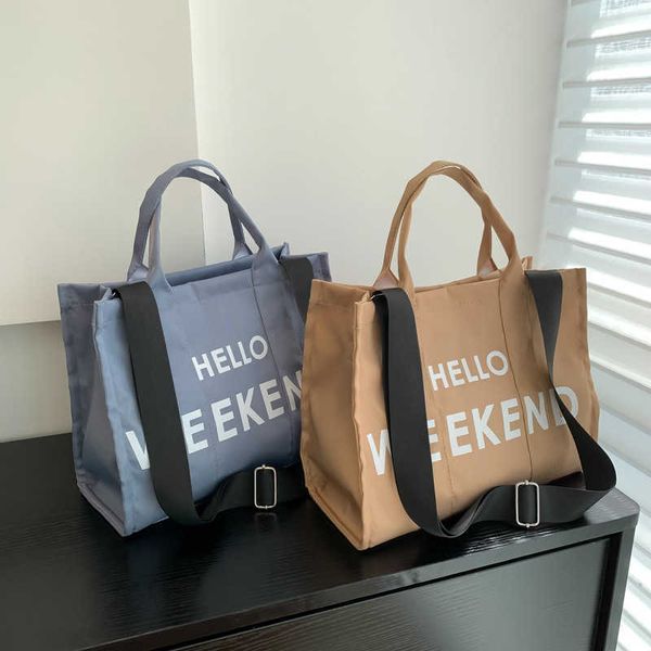 crossbody handheld canvas bag for women south korea new one shoulder letter tote bag simple casual large capacity fashion women's bag
crossbody handheld canvas bag for women south korea new one shoulder letter tote bag simple casual large capacity fashion women's bag