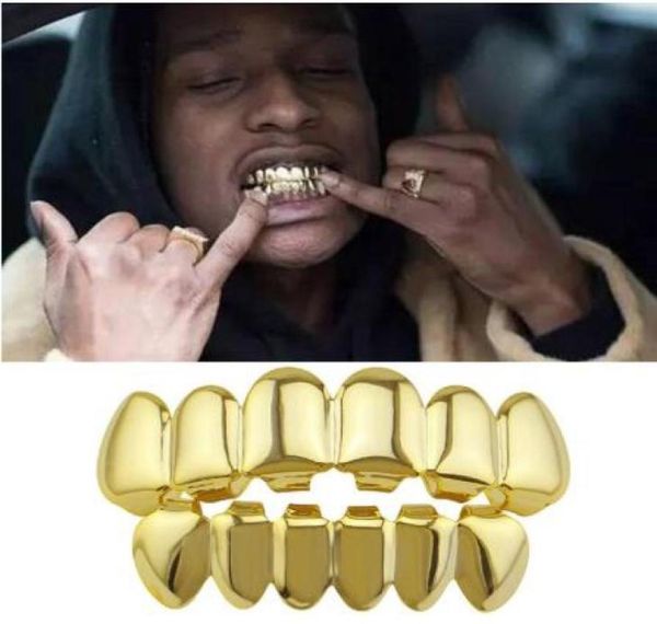 hip hop gold teeth upper and bottom grills dental mouth punk teeth caps cosplay party tooth rapper body jewelry gift1005071
hip hop gold teeth upper and bottom grills dental mouth punk teeth caps cosplay party tooth rapper body jewelry gift1005071