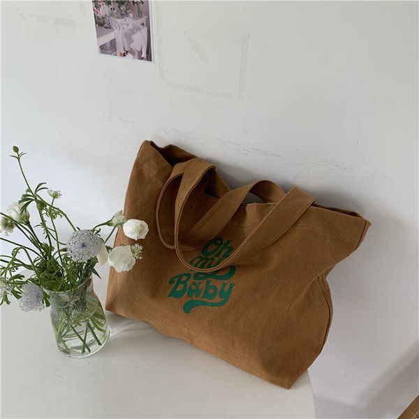 version new large capacity single shoulder canvas women's bag letter printing design portable tote bag simple bag women's fashion
version new large capacity single shoulder canvas women's bag letter printing design portable tote bag simple bag women's fashion