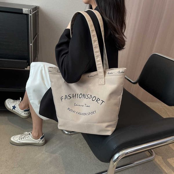 version large capacity portable one shoulder canvas bag for women's bag new minimalist casual letter commuting tote bag
version large capacity portable one shoulder canvas bag for women's bag new minimalist casual letter commuting tote bag