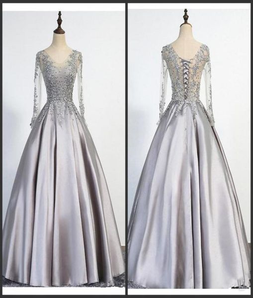 elegant plus size silver evening dresses long 2020 new long sleeves scoop lace up floor length appliques beading real picture prom5523742, Black;red
elegant plus size silver evening dresses long 2020 new long sleeves scoop lace up floor length appliques beading real picture prom5523742, Black;red