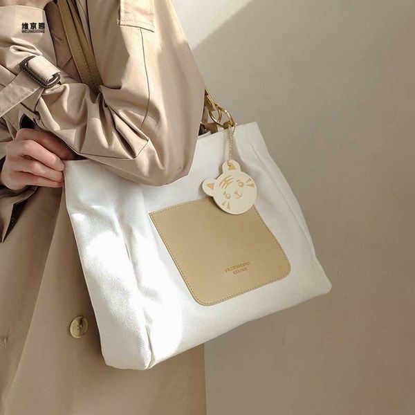 handbag canvas large capacity bag women's summer new versatile shoulder bag college student class tote bag
handbag canvas large capacity bag women's summer new versatile shoulder bag college student class tote bag