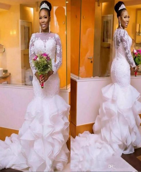 african long sleeves wedding dress plus size lace fishtail sheer neck bodycon fishtail bridal gowns beaded chic layer ruffles robe7554210, White
african long sleeves wedding dress plus size lace fishtail sheer neck bodycon fishtail bridal gowns beaded chic layer ruffles robe7554210, White