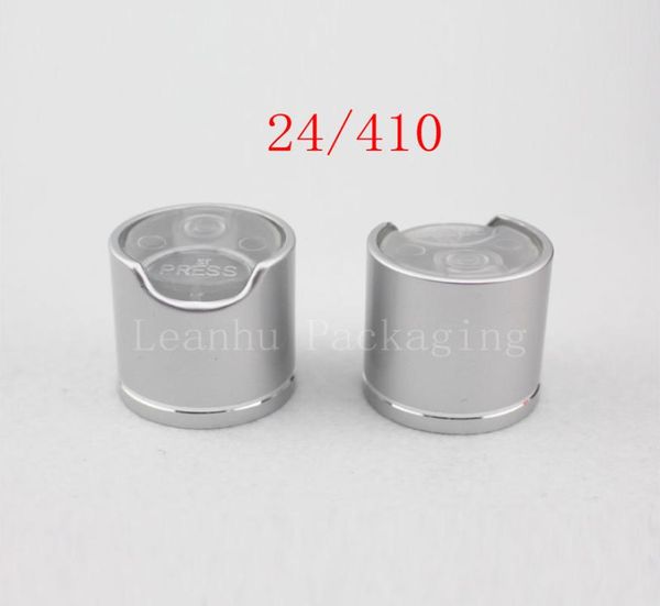 silver disc caps with aluminum collar 24410 aluminum shampoo capplastic bottle cap push pull press caps7815567
silver disc caps with aluminum collar 24410 aluminum shampoo capplastic bottle cap push pull press caps7815567