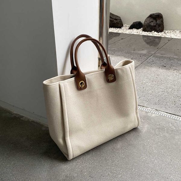 simple canvas handheld women's bag trend fashion trend women's big bag tote one shoulder tide summer chain new women's bag
simple canvas handheld women's bag trend fashion trend women's big bag tote one shoulder tide summer chain new women's bag