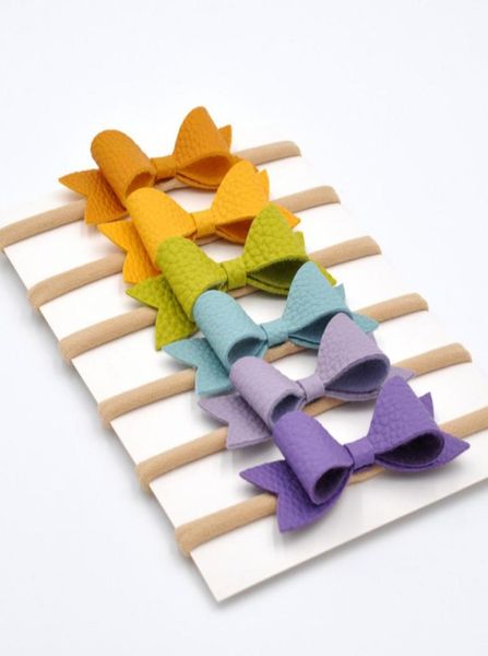 3inch faux leather hair bow headbands nylon headband newborn hair band baby girl hair accessory 36pcslot9554671, Slivery;white
3inch faux leather hair bow headbands nylon headband newborn hair band baby girl hair accessory 36pcslot9554671, Slivery;white