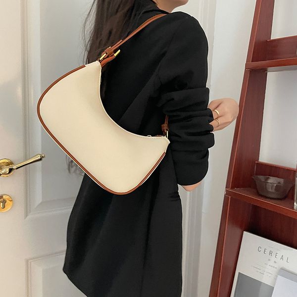 2023 summer new women's bag moon teeth underarm bag contrast crescent saddle bag high end fashionable one shoulder handbag
2023 summer new women's bag moon teeth underarm bag contrast crescent saddle bag high end fashionable one shoulder handbag