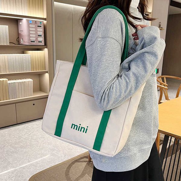 new trendy canvas bag for female college students version leisure single room bag with large capacity and simple letter handheld tote bag
new trendy canvas bag for female college students version leisure single room bag with large capacity and simple letter handheld tote bag