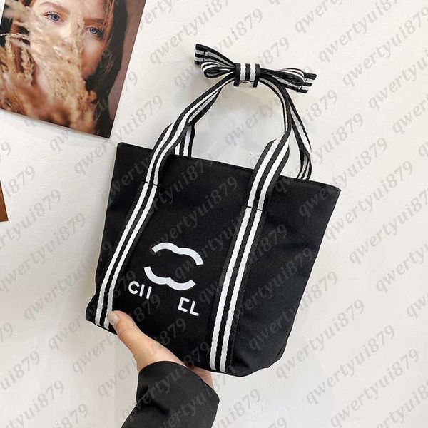 designer bag 2024 new mini handbag women's fashion casual small bag shopping bag bow tote underarm bag striped medieval tie canvas bag
designer bag 2024 new mini handbag women's fashion casual small bag shopping bag bow tote underarm bag striped medieval tie canvas bag