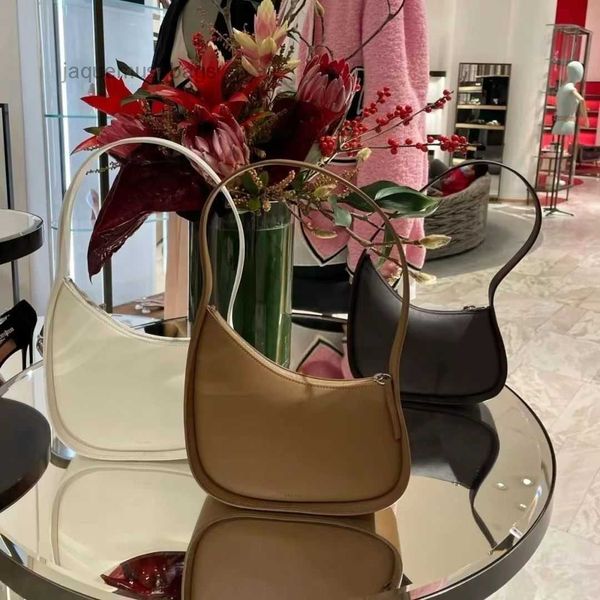 new the row half moon bag in smooth leather women designer with flat shoulder strap and curved zipper closure clutch tote suded lining under
new the row half moon bag in smooth leather women designer with flat shoulder strap and curved zipper closure clutch tote suded lining under