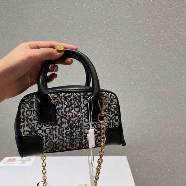 lowe brand mini handbag designer bag women's leather graffiti jacquard handheld leather wallet fashion chain crossbody bag
lowe brand mini handbag designer bag women's leather graffiti jacquard handheld leather wallet fashion chain crossbody bag