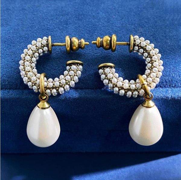 vintage style brass material earrings with personalized design sense inlaid with pearls elegant temperament c-shaped earrings jewelry, Silver
vintage style brass material earrings with personalized design sense inlaid with pearls elegant temperament c-shaped earrings jewelry, Silver