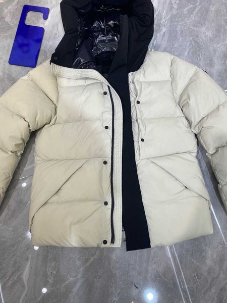 autumn and winter men's hooded loose down coat, black and white patchwork fashion novel, oblique pocket design warm and fashionable.
autumn and winter men's hooded loose down coat, black and white patchwork fashion novel, oblique pocket design warm and fashionable.