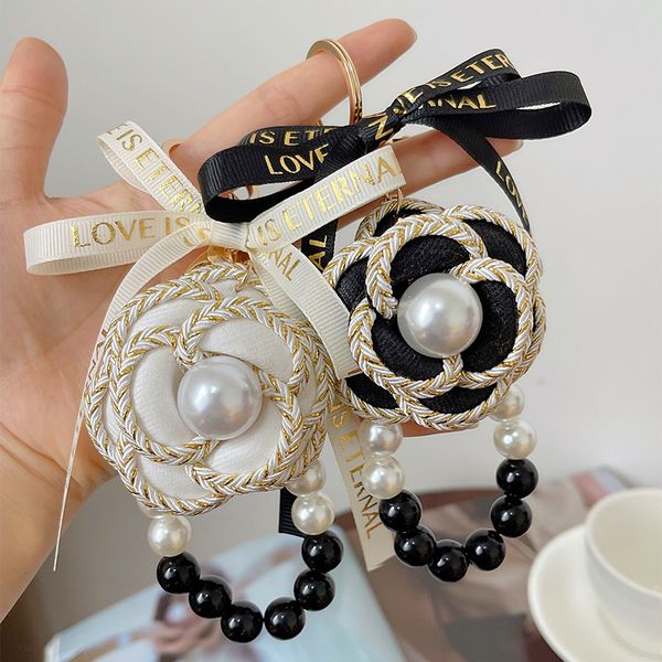 pretty fabric flower pearl ribbon bow keychains car key ring new fashion bag purse charms key chain for women girls gifts, Silver
pretty fabric flower pearl ribbon bow keychains car key ring new fashion bag purse charms key chain for women girls gifts, Silver