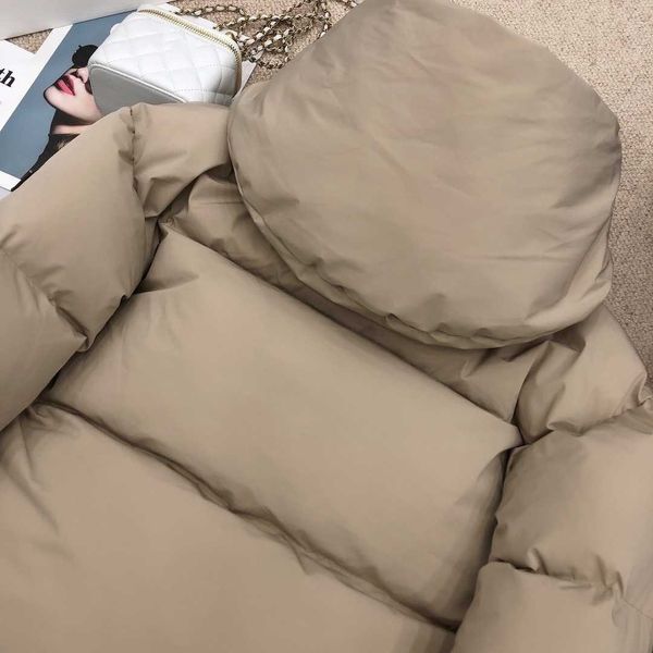 autumn and winter triangle mark hooded bread coat type down coat, men and women the same, front and back side zipper design, classic simple, Black
autumn and winter triangle mark hooded bread coat type down coat, men and women the same, front and back side zipper design, classic simple, Black