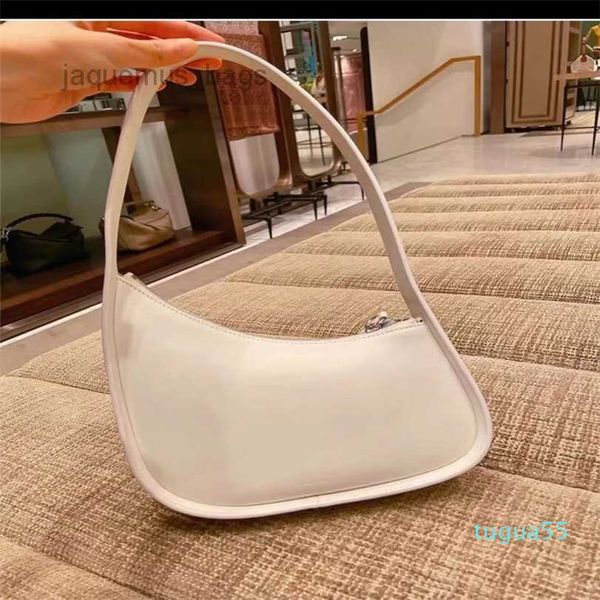 the row half moon bag in smooth leather women designer with flat shoulder strap and curved zipper
the row half moon bag in smooth leather women designer with flat shoulder strap and curved zipper