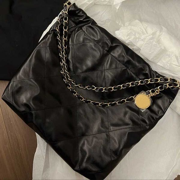 with label 2022 new autumn and winter high-capacity shopping bag 22bag small fragrant garbage tote underarm
with label 2022 new autumn and winter high-capacity shopping bag 22bag small fragrant garbage tote underarm