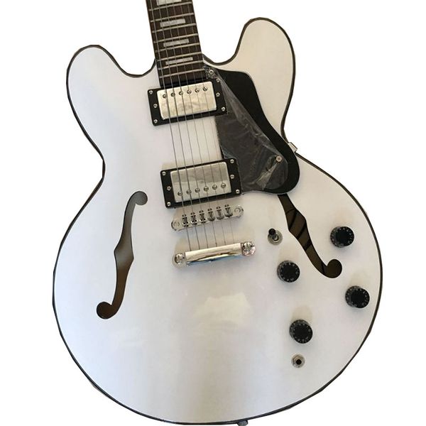new white electric guitar, double f-hole, silver accessories,factory customized
new white electric guitar, double f-hole, silver accessories,factory customized