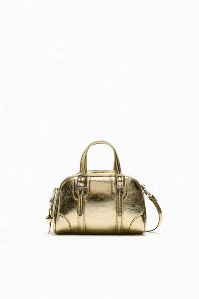 z family bag women's spring new product buckle decoration bright handheld one shoulder oblique cross pillow bag
z family bag women's spring new product buckle decoration bright handheld one shoulder oblique cross pillow bag
