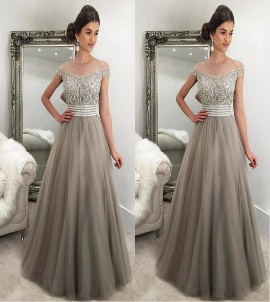 2017 elegant silver gray evening dresses off shoulder cap sleeves crystal beaded tulle puffy saudi arabic formal evening gowns pro9534870, Black;red
2017 elegant silver gray evening dresses off shoulder cap sleeves crystal beaded tulle puffy saudi arabic formal evening gowns pro9534870, Black;red