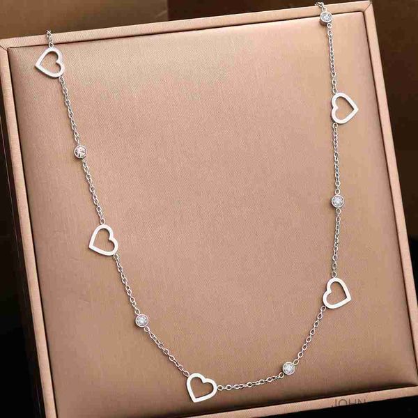 pendant stainless steel elegant hollow heart light luxury crystal choker chain creative necklace for women jewelry new r230703, Silver
pendant stainless steel elegant hollow heart light luxury crystal choker chain creative necklace for women jewelry new r230703, Silver