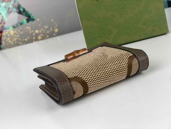 designer's bamboo wallet fashionable classic style beautiful mini card bag made of cowhide designer coin wallet tote bag, Red;black
designer's bamboo wallet fashionable classic style beautiful mini card bag made of cowhide designer coin wallet tote bag, Red;black
