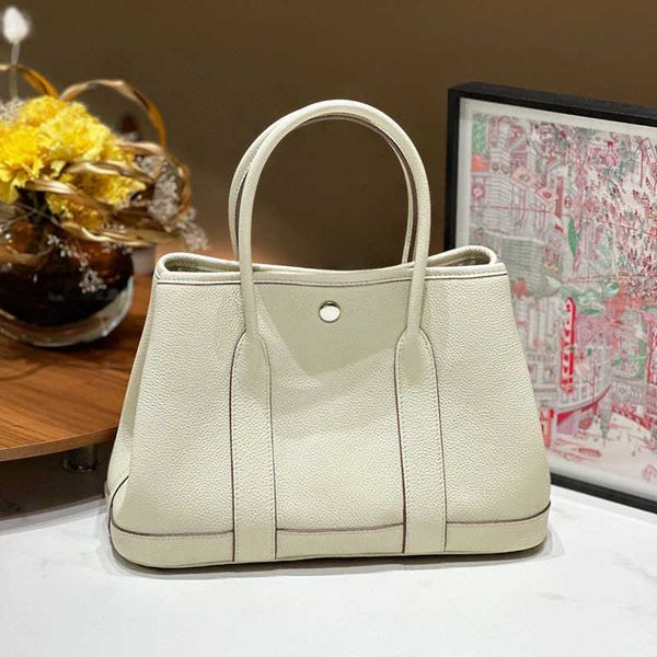 classic hemrres tote bags garden party high end women's bag garden togo cowhide tote large capacity tongle women's mommy taob
classic hemrres tote bags garden party high end women's bag garden togo cowhide tote large capacity tongle women's mommy taob