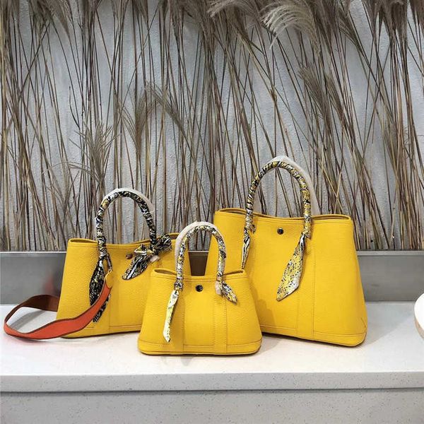 designer bags garden party baotou layer cowhide litchi pattern with canvas shoulder strap large medium and small size child mother handheld
designer bags garden party baotou layer cowhide litchi pattern with canvas shoulder strap large medium and small size child mother handheld
