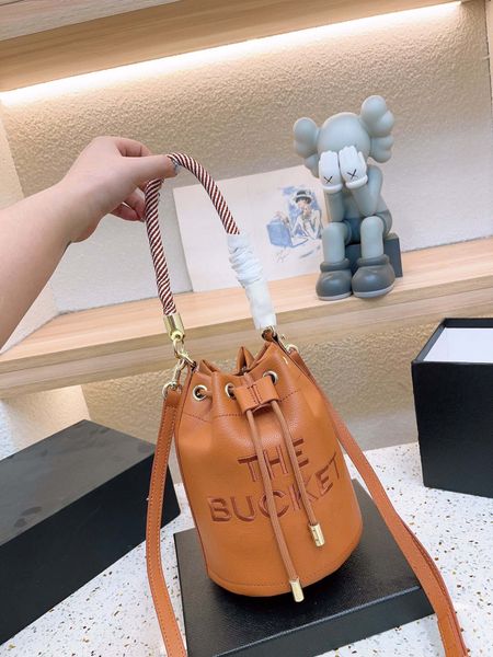 10a designer mj luxury women's handbag drawstring bucket bag shoulder bag crossbody bag 22cm
10a designer mj luxury women's handbag drawstring bucket bag shoulder bag crossbody bag 22cm