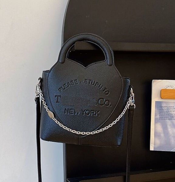 tlffanys bag pu leather bucket bag women one shoulder crossbody bag designer bag handbag litchi grain chain decoration tote luxury shopping
tlffanys bag pu leather bucket bag women one shoulder crossbody bag designer bag handbag litchi grain chain decoration tote luxury shopping