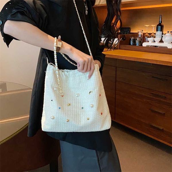 new evening bags small design bucket bag summer chain cute diamond embedding shoulder versatile women's crossbody 230704
new evening bags small design bucket bag summer chain cute diamond embedding shoulder versatile women's crossbody 230704