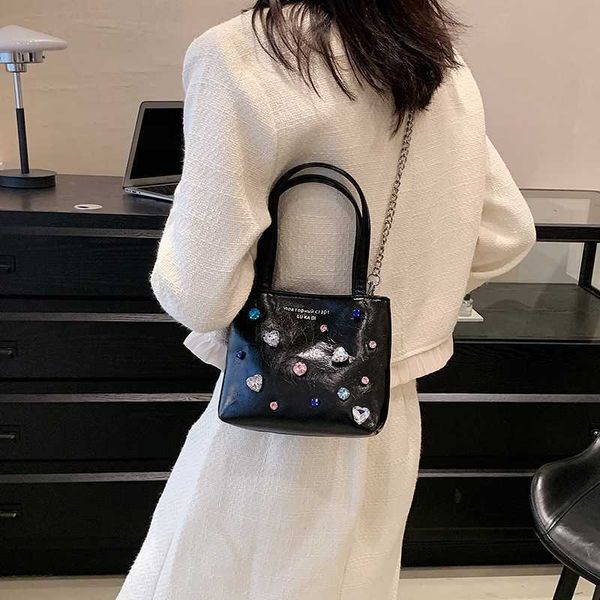 lady evening bags korean fashion summer handheld bag for women's colorful diamond bucket small and high end chain crossbody 230704
lady evening bags korean fashion summer handheld bag for women's colorful diamond bucket small and high end chain crossbody 230704
